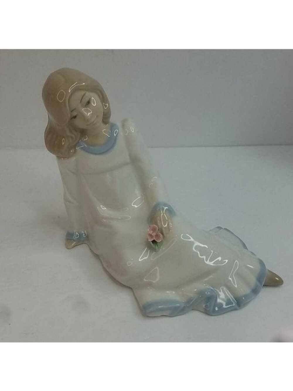 Vintage 1980s Nadal Porcelain Sitting Girl with Flower Figurine
